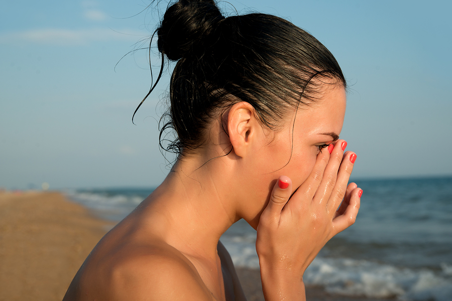 Close-up Of A Young Woman Rubbing Irritated Sensitive Eyes On