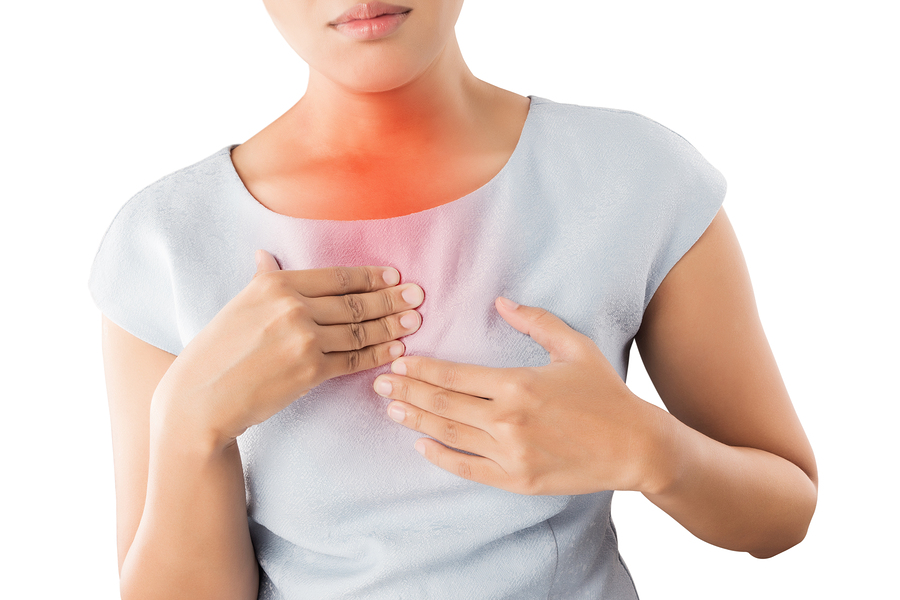 Girl with symptomatic acid reflux. isolate on white background