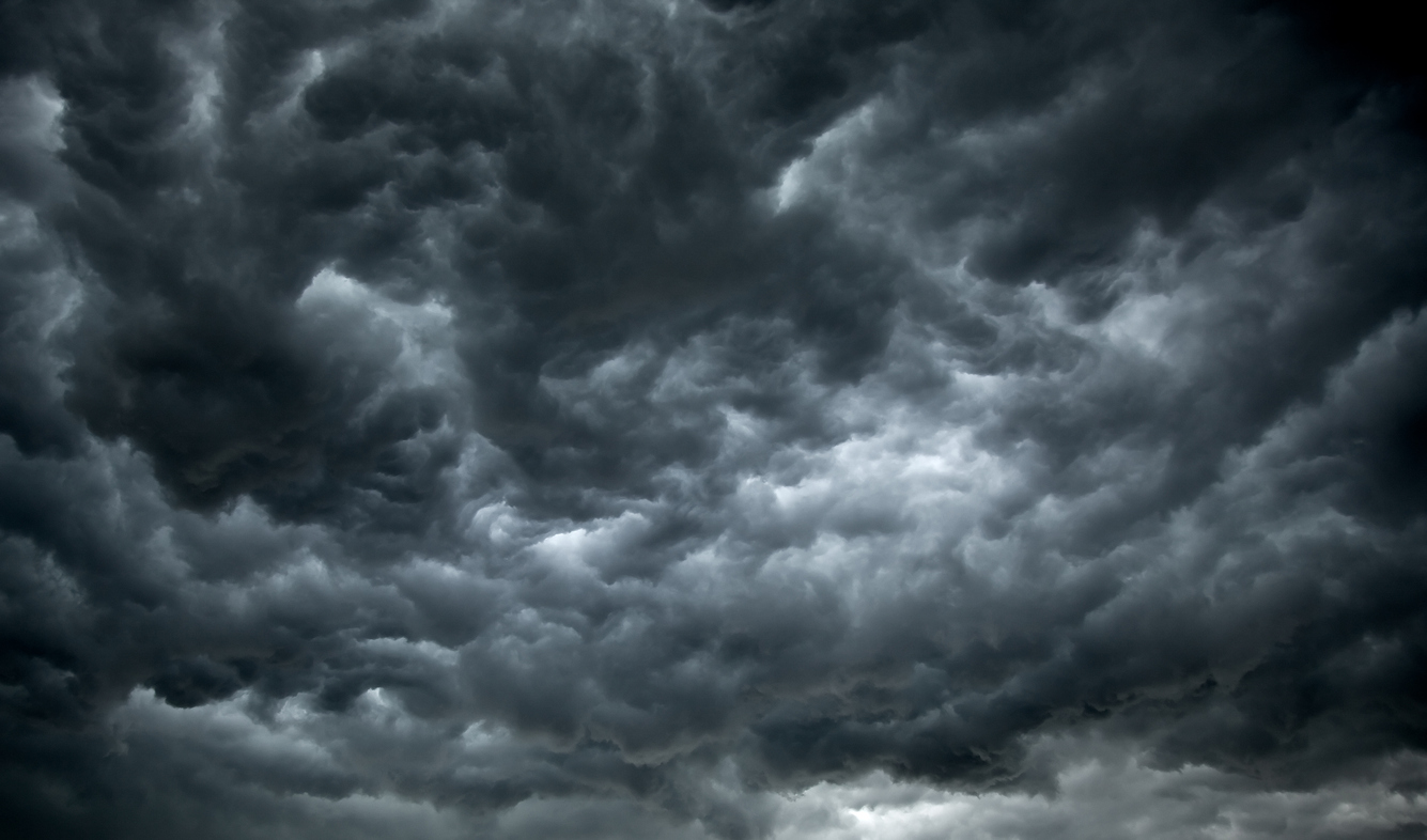 Threatening dark clouds covering the sky