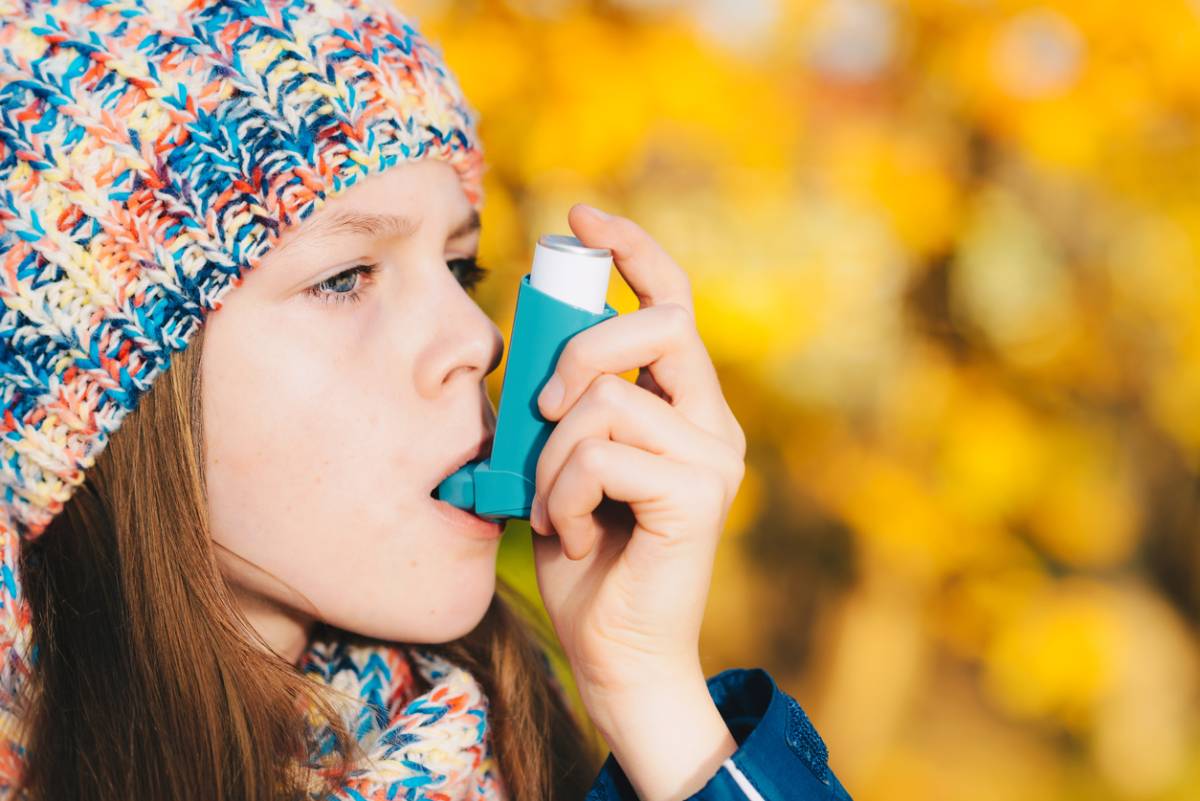 Child having trouble during worst season for childhood asthma