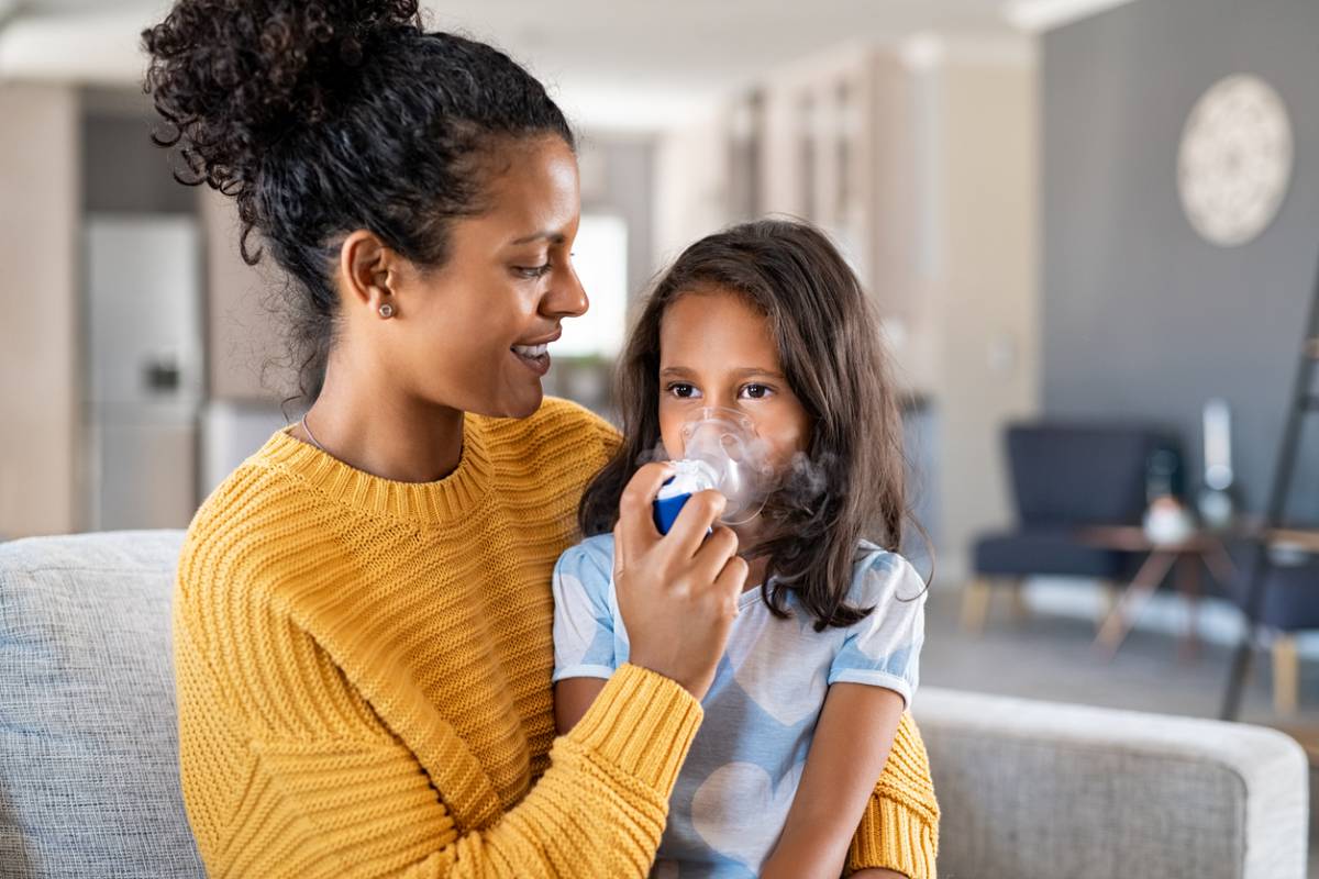 mother caring for her kids with asthma