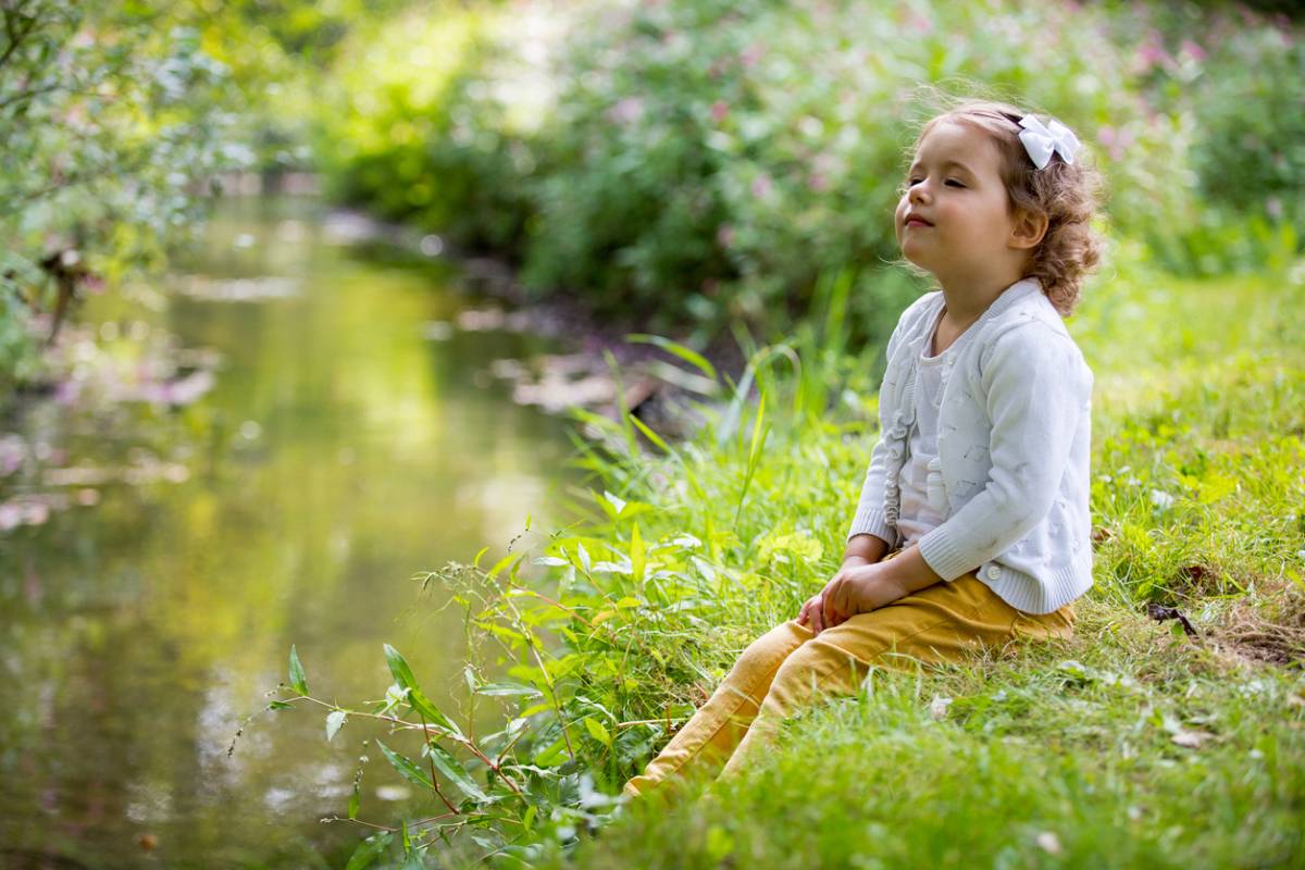 concept image of kid doing breathing exercises